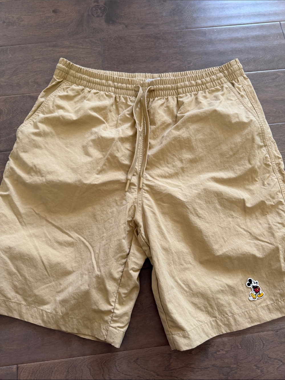 Disney Men's Light Tan Drawstring Athletic Shorts with Mickey Patch